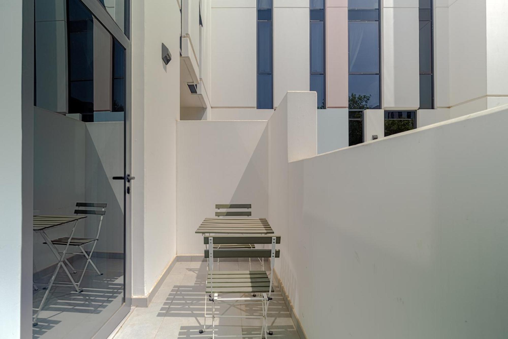 Garden & Pool Access Apartment Sharjah